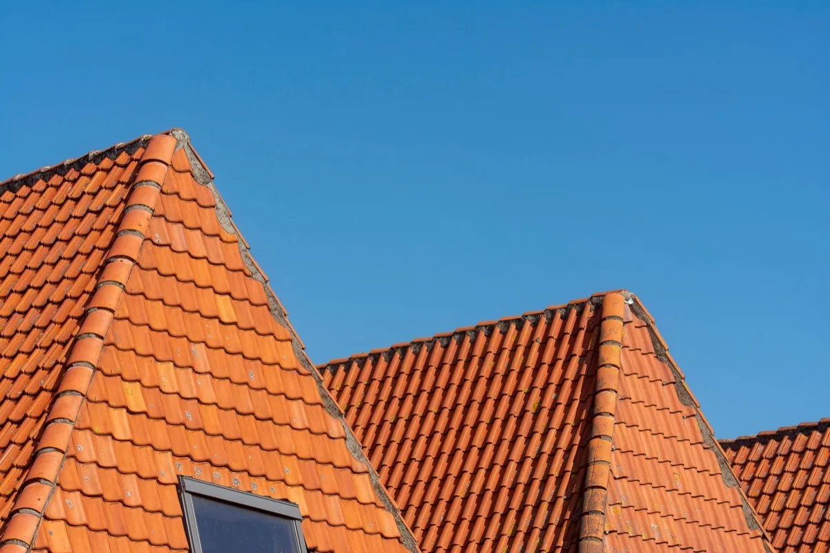 Clay barrel tile rooflines on homes in Warren, MI
